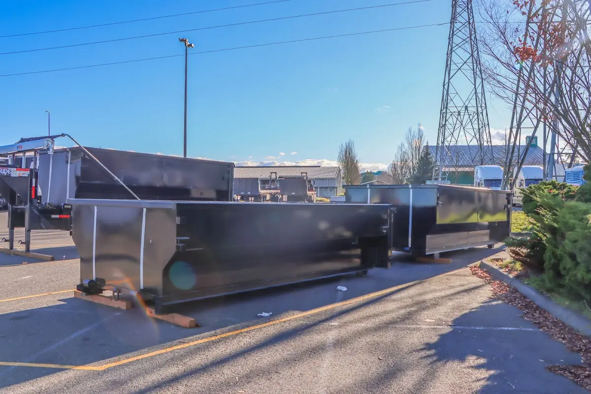 Roll-off dumpster ready for waste disposal at job site for Concrete Dumpster Rental in Granville